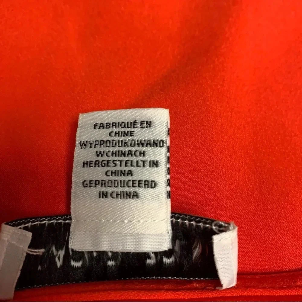 Rachel Zoe bright orange blouse size Small bold seam down the front